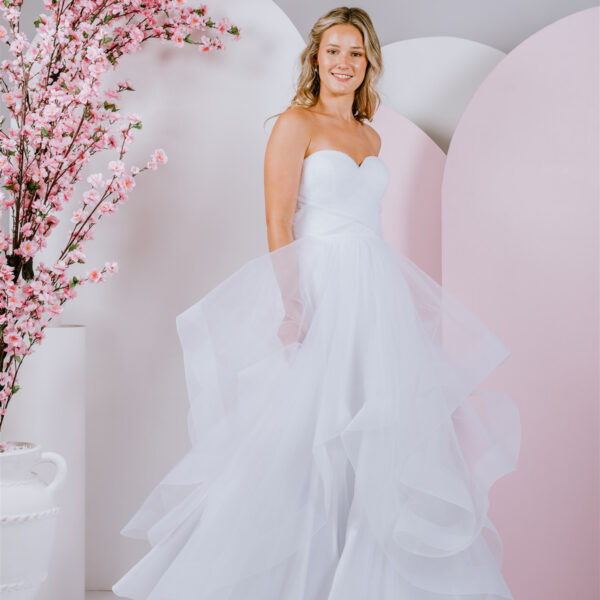 frills and ruffles debutante gown