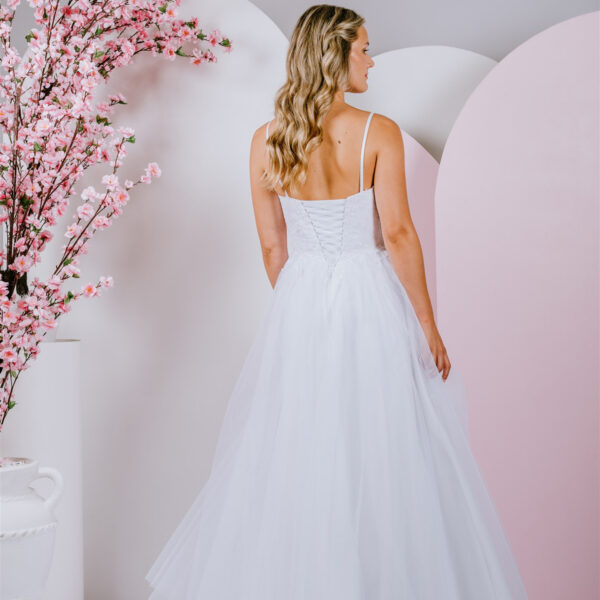 Delicately placed floral lace deb gown