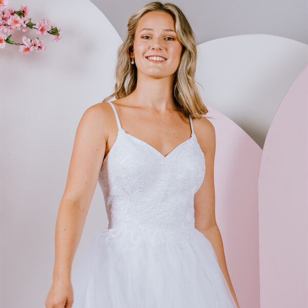 Delicately placed floral lace deb gown