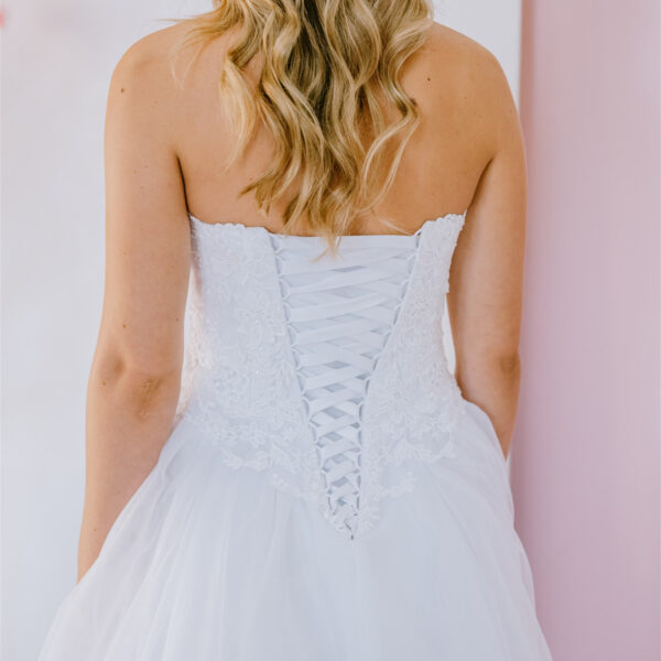 Floral swirls of lace debutante gown
