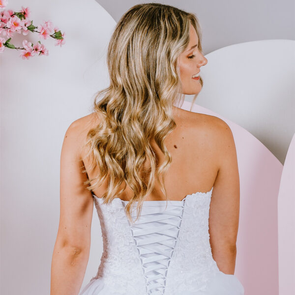 Floral swirls of lace debutante gown