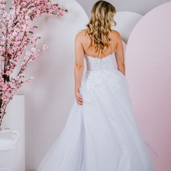 Sparkling lace adornes deb gown