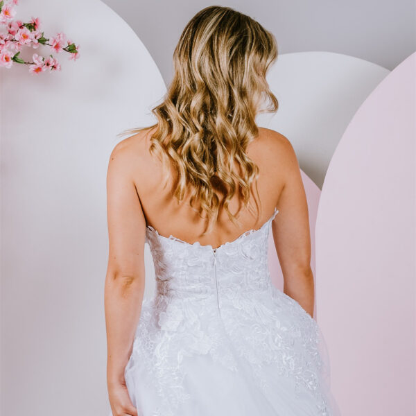Sparkling lace adornes deb gown