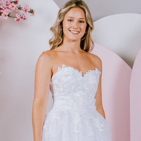 Sparkling lace adornes deb gown